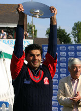 Yaser Sadeq holds the ICC World Cricket League Division Seven trophy following Bahrain's three-wicket win against Guernsey © Barry Chambers