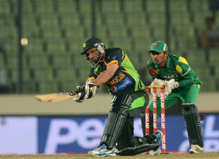 Shahid Afridi clubbed seven sixes during a 25-ball 59 to seal Pakistan's place in the Asia Cup final with a three-wicket win against Bangladesh in Mirpur © AFP