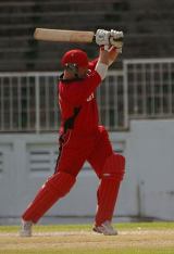 Ian Billcliff drives during his 48 which helped Canada to victory over Bermuda in Antigua © Eddie Norfolk