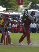 Chris Gayle smashed six sixes in his unbeaten 110 to guide West Indies to victory over Canada in the final of the tri-series in King City © Eddie Norfolk
